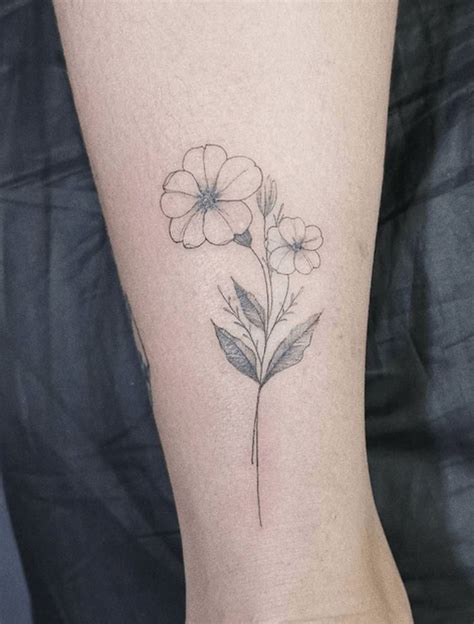 minimalist violet tattoo|violet iris and primrose tattoo.